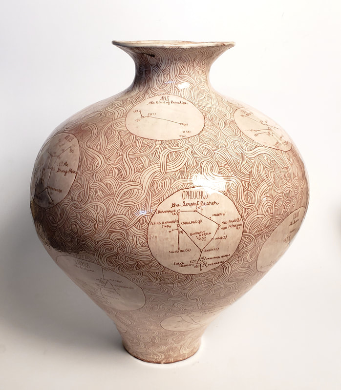 terra cotta vase with sgraffito decoration of astronomy