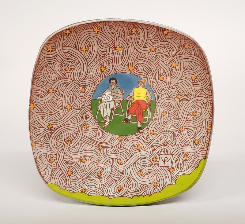 terra cotta plate with sgraffito decoration of two women on lawn chairs